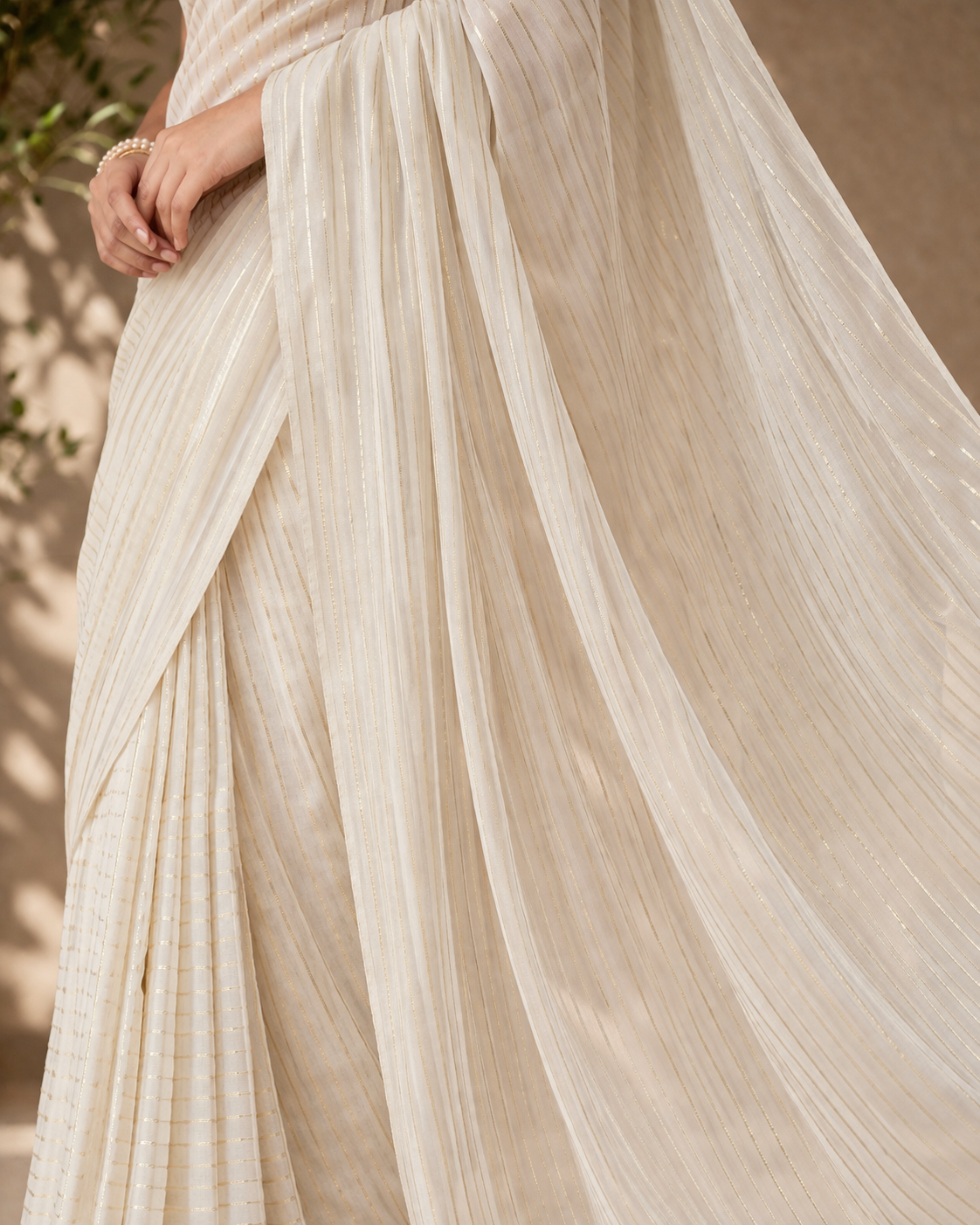 Off-White Fine Striped Organza Saree with Subtle Gold Detailing | Elegant Party Wear Saree